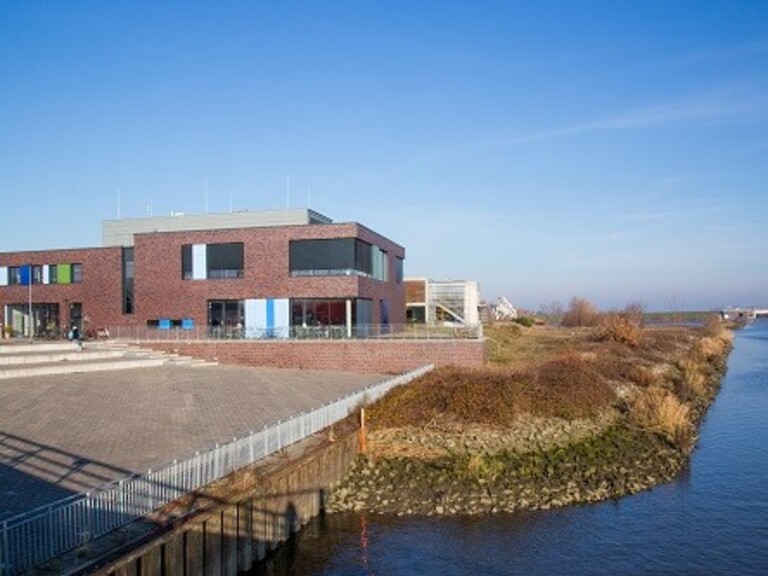 Exterior shot of Elsfleth Library viewed from the river Hunte